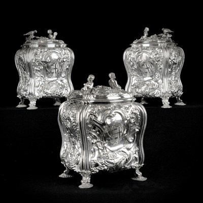 Lot 71 - Set of George II silver tea canisters and sugar box in fitted ebonised case