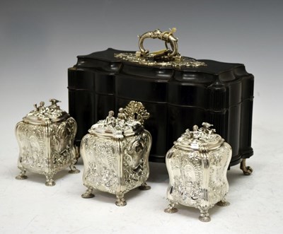 Lot 71 - Set of George II silver tea canisters and sugar box in fitted ebonised case