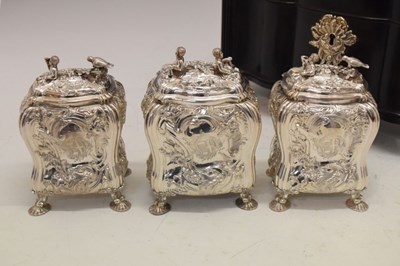 Lot 71 - Set of George II silver tea canisters and sugar box in fitted ebonised case