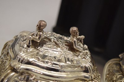 Lot 71 - Set of George II silver tea canisters and sugar box in fitted ebonised case