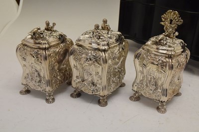 Lot 71 - Set of George II silver tea canisters and sugar box in fitted ebonised case