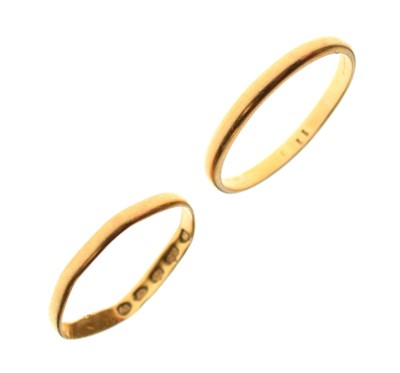Lot 23 - Two 22ct gold wedding bands