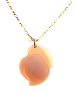 Lot 86 - Chinese carved hardstone (possibly jade) peach pendant with fine chain