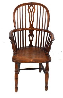 Lot 506 - 19th Century yew, ash and elm low hoop back Windsor armchair