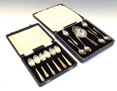 Lot 190 - George V cased silver teaspoons and strainer, together with cased Elizabeth II silver coffee spoons