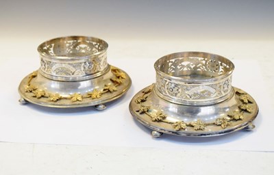 Lot 276 - Pair of silver plated engraved bottle stands