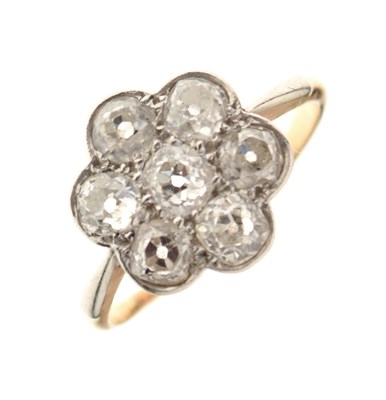Lot 11 - Seven stone diamond cluster ring