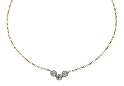Lot 47 - Three stone diamond necklace