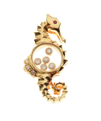 Lot 71 - Seahorse pendant with 'floating' diamonds, and ruby eye, stamped 'K18'