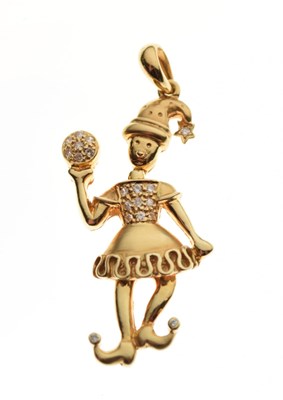 Lot 69 - Diamond set yellow metal articulated clown pendant