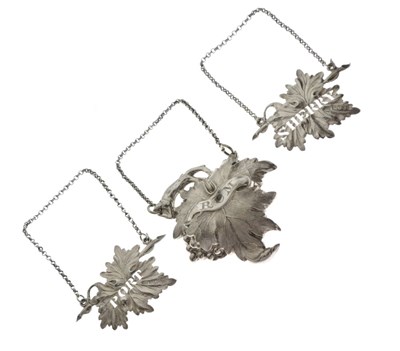 Lot 79 - Pair of Victorian silver vine leaf spirit labels for Port and Sherry, plus an unmarked example