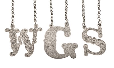 Lot 80 - Two Victorian silver spirit labels initialled for Whisky, and Sherry, with a similar unmarked