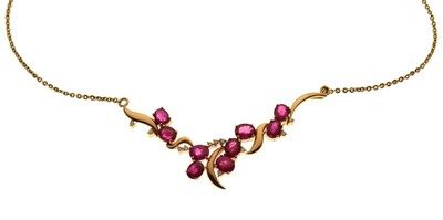 Lot 40 - Yellow metal (750) ruby and diamond pendant