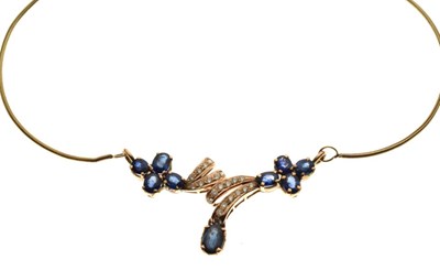 Lot 41 - Yellow metal, sapphire and diamond pendant