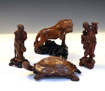 Lot 210 - Four Chinese wooden sculptures to include a tortoise, etc.