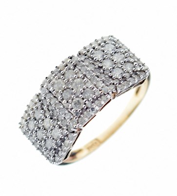 Lot 3 - Yellow metal dress ring set three panels of brilliant cut diamonds