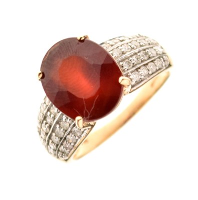 Lot 11 - 9ct gold ring set red stone and diamonds