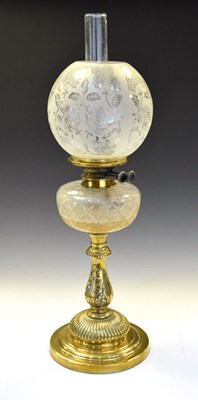 Lot 605 - Cast brass oil lamp