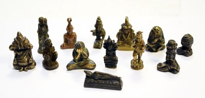 Lot 213 - Thirteen Thai and other South East Asian miniature bronzes