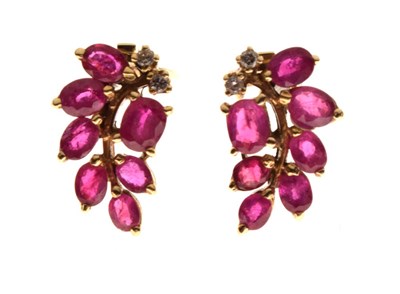 Lot 43 - Pair of yellow metal (585) and ruby ear studs