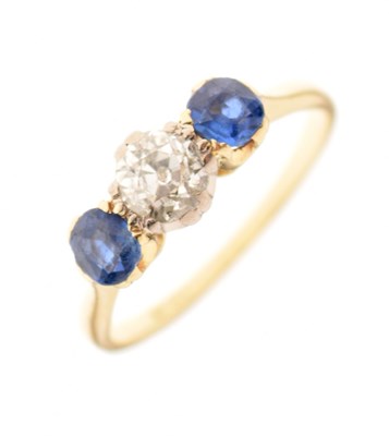 Lot 4 - Yellow metal, sapphire and diamond three-stone ring