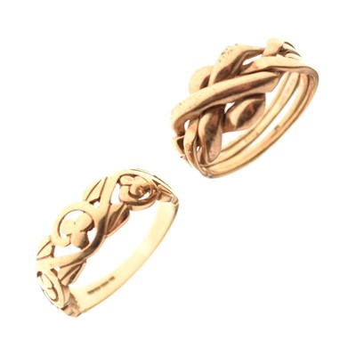Lot 20 - 9ct gold puzzle ring, and 9ct gold scroll design ring (2)