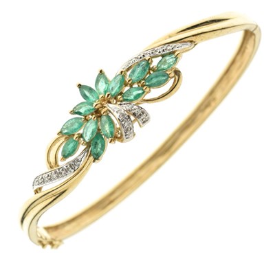 Lot 45 - 9k yellow metal, emerald and diamond snap bangle