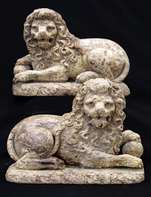 Lot 172 - Rare pair of late 16th or early 17th Century carved limewood recumbent lions