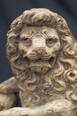 Lot 172 - Rare pair of late 16th or early 17th Century carved limewood recumbent lions