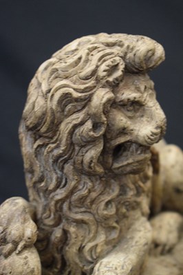Lot 172 - Rare pair of late 16th or early 17th Century carved limewood recumbent lions