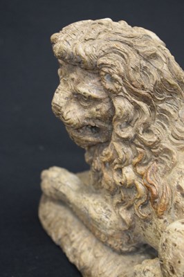 Lot 172 - Rare pair of late 16th or early 17th Century carved limewood recumbent lions