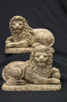 Lot 172 - Rare pair of late 16th or early 17th Century carved limewood recumbent lions