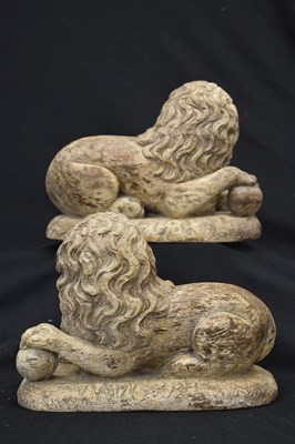 Lot 172 - Rare pair of late 16th or early 17th Century carved limewood recumbent lions