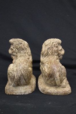 Lot 172 - Rare pair of late 16th or early 17th Century carved limewood recumbent lions