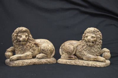 Lot 172 - Rare pair of late 16th or early 17th Century carved limewood recumbent lions