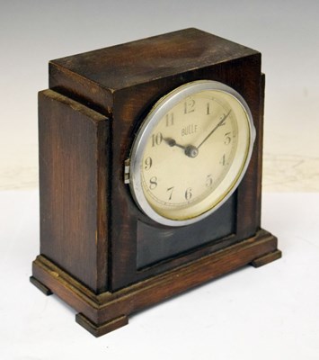 Lot 365 - Bulle electric mantel clock in Art Deco style oak case