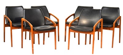 Lot 489 - Kai Kristiansen teak dining table and six model 121 open armchairs