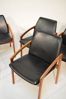 Lot 489 - Kai Kristiansen teak dining table and six model 121 open armchairs