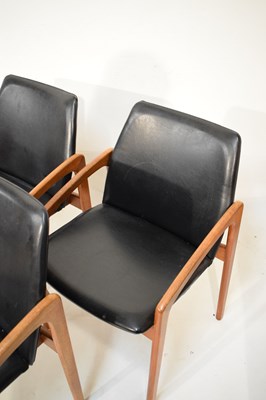 Lot 489 - Kai Kristiansen teak dining table and six model 121 open armchairs