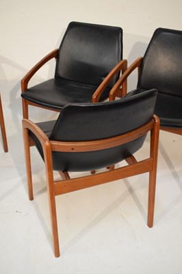 Lot 489 - Kai Kristiansen teak dining table and six model 121 open armchairs