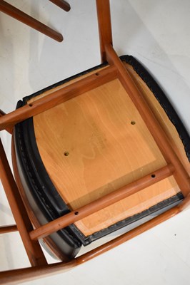 Lot 489 - Kai Kristiansen teak dining table and six model 121 open armchairs