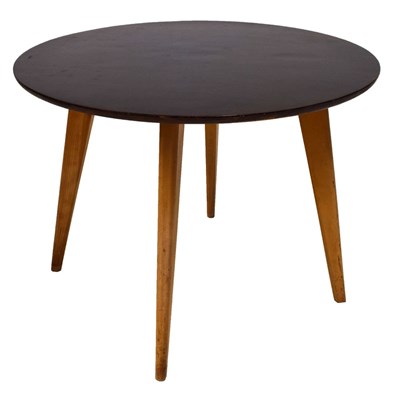 Lot 672 - Mid 20th Century beech and plywood circular top occasional table