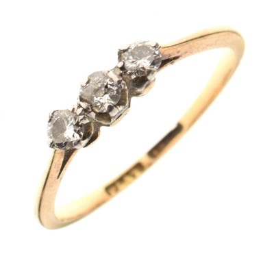 Lot 12 - 18ct gold and platinum graduated three stone diamond ring