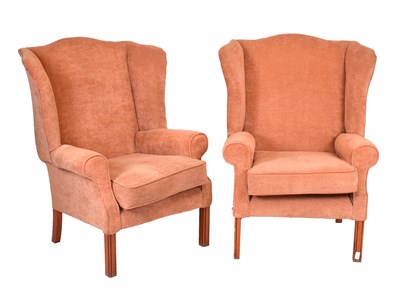 Lot 678 - Pair of Georgian-style wingback armchairs, upholstered in salmon pink fabric