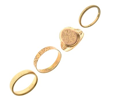 Lot 20 - Three 9ct gold wedding bands, and a 15ct gold signet ring