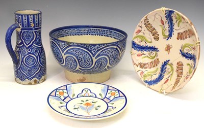 Lot 336 - Moroccan faience-glazed pottery jug and bowl