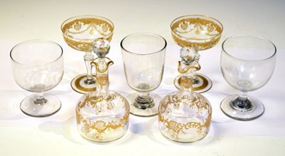 Lot 339 - French gilt glass champagne coupes and bottles