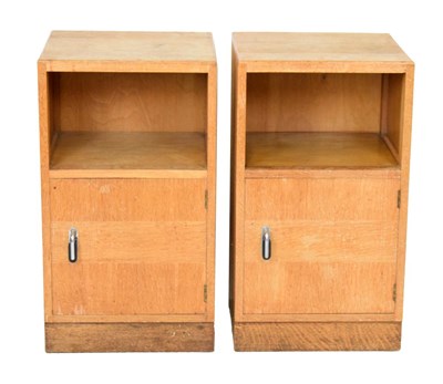 Lot 585 - Pair of Art Deco light oak bedside cabinets