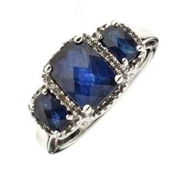 Lot 9 - Sapphire and diamond triple cluster ring