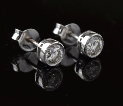 Lot 43 - Pair of diamond single stone ear studs